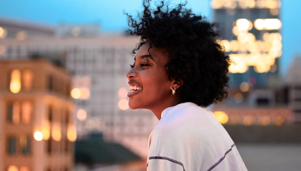 woman with straight teeth from Invisalign in San Marcos, CA